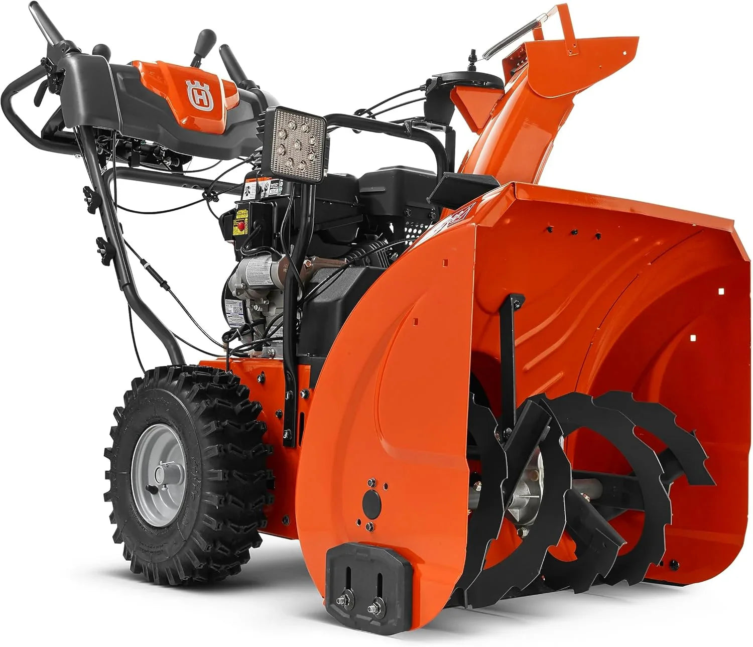Orange and black snowblower on a white background