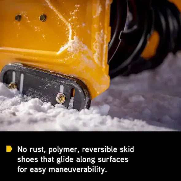 Close-up of a snow blower in action with text highlighting features.